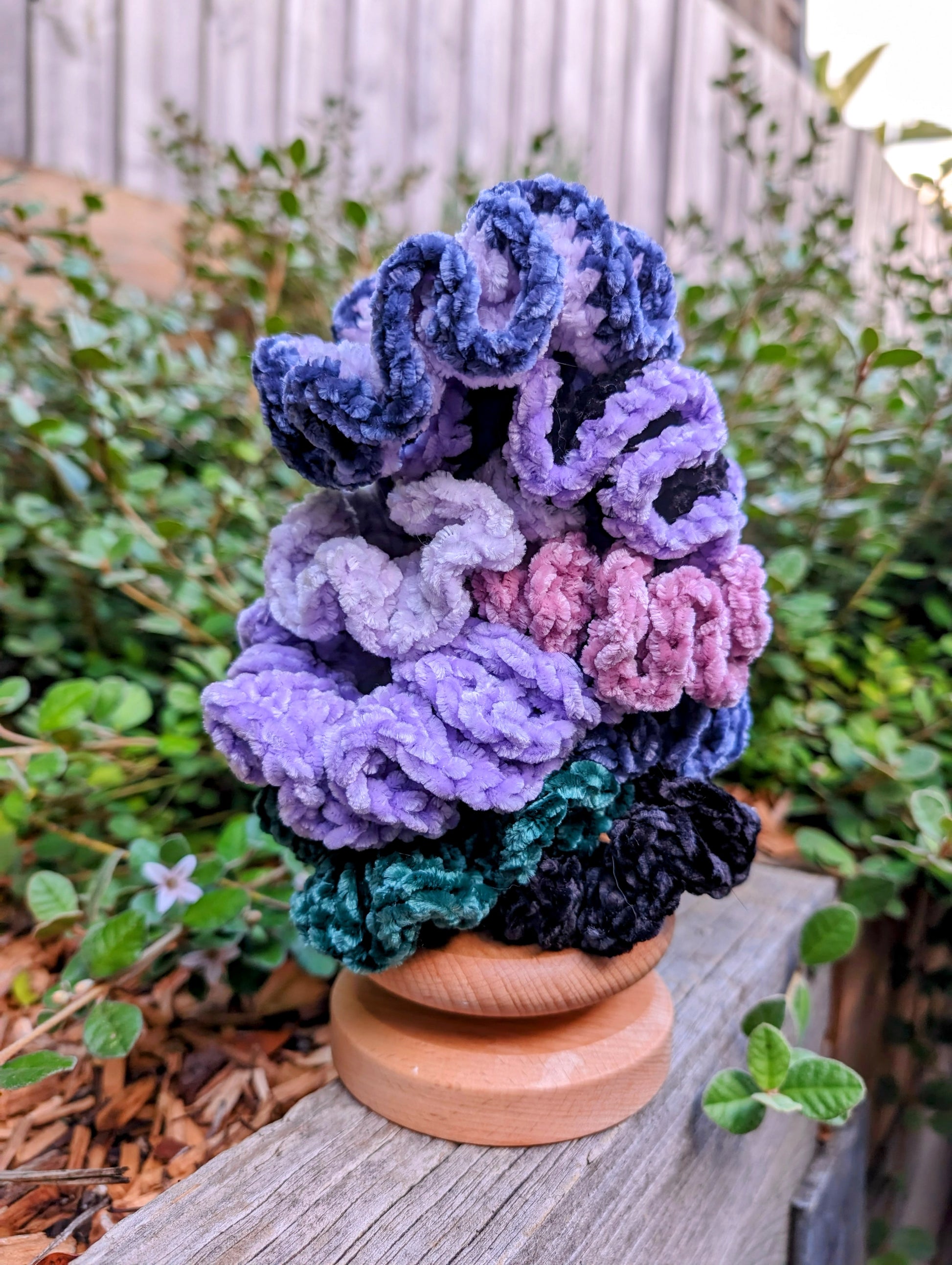 stack of super soft handmade velvet crochet scrunchies in multiple colours 